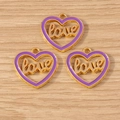 Three purple enamel heart pendants with gold frames and love engraving on wood - LOVE Heart Style / 10 Pieces Pack / Purple