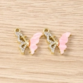 Détails des pendentifs papillons avec texture marbrée rose et strass scintillants - Style Papillon en Strass / 5 Pièces / Or Rose