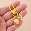 Vibrant yellow butterfly keychain with metal clasp and matching bell pendant - Yellow