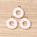 Detail of lifebuoy-shaped charms with pink and white enamel for DIY jewelry making - Pink Lifebuoy