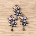 Y2K star charms with pink rhinestones and pearls on a vintage black alloy base - Black Pink