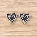 Detail of silver and black enamel double heart charms with star accents for DIY jewelry - Silver Black