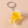 Macro detail of a creative beer mug keychain with realistic resin foam and metal ring - Beer