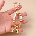 Portachiavi arcobaleno con chiusura a cuore, perle barocche e ciondolo in smalto - Oro Arcobaleno