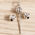 Detailed view of vintage silver pumpkin charms and metal bead findings for jewelry - Pumpkin Shape Style / 50 Pieces / Antique Silver