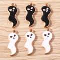 Detailed view of Halloween ghost charms with black and white enamel and gold plating - 10 Pieces Pack / Mixed Color Large Ghost
