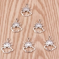 Macro detail of sun and cloud face alloy charms for DIY jewelry in antique silver - Silver Cloud Sun