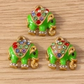 Three gold alloy elephant charms with green enamel and colorful rhinestones for DIY jewelry - 10 Pieces Pack / Green Elephant