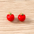 Detailed view of red enamel apple charms with gold leaves on wooden background - 5 Pieces / Apple