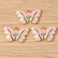 Pink butterfly charms with lily of the valley pattern and gold plated alloy edges - 10 Pieces Pack / Pink Butterfly