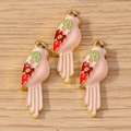 Three parrot-shaped pendants in gold alloy with vibrant enamel for DIY jewelry making - 10 Pieces Pack / Pink Parrot
