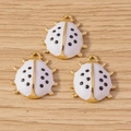Three-piece ladybug jewelry pendants with pink enamel and black spots on gold metal base - 10 Pieces Pack / White Ladybug