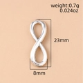 Silver infinity figure-eight jewelry pendant showing dimensions 23mm by 8mm and weight - Silver