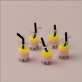 Detailed macro view of 5 gradient bubble tea charms with black straws and metal rings - 10 Pieces Pack / Yellow-Pink