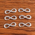 Pack of 50 silver infinity symbol charms for DIY jewelry making and necklaces - Bright Silver