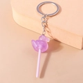 Schattige paarse eend lolly sleutelhanger met glitterhars en metalen ring - Paarse Eend Lolly
