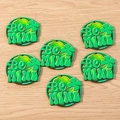 Detailed view of Be Mine shamrock charms with a wooden texture for DIY St. Patrick's Day - 10 Pieces Pack / Letter Clover