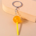 Orange translucent resin lollipop keychain with glitter and silver metal ring - Orange Round Lollipop