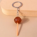 Brown resin lollipop keychain with glitter and silver ring in creative animal theme - Brown Round Lollipop