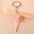 Pink resin dinosaur lollipop keychain with silver metal ring and creative design - Pink Dinosaur Lollipop