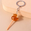 Creative animal lollipop keychain with translucent amber duck charm and silver ring - Brown Dinosaur Lollipop