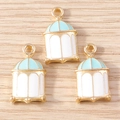Pendentifs cage à oiseaux dorés avec émail bleu et blanc pour création bijoux DIY - Bleu Lac