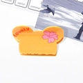 Haarklammer in lichtgelb mit Lovely-Schriftzug und rosa Blumenmuster im Comic-Stil - Gelb 7.2cm