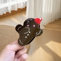 Festive gingerbread man hair claw clip with red hat in hand for Christmas accessory - Brown Red Hat Gingerbread Man