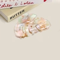 Roze en groene monstera blad haarklem van acetaat met goudkleurige nerven en aders - Bont 9.3cm