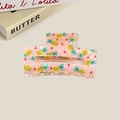 Pink translucent claw clip with yellow pineapple prints and heart accents - Pineapple