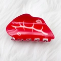 Red lip-shaped acrylic hair claw clip with white patterns on a plush background - Style H-8cm
