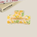 Square hair claw clip featuring yellow lemon and green lime print on transparent base - Lemon