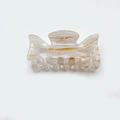 White marbled acetate hair claw clip with golden patterns for stylish hair styling - White