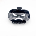 Glossy black pumpkin hair claw clip with Jack-o'-lantern cutout for Halloween style - Large / Pumpkin Pattern