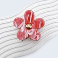 Blumen-Haarklammer aus Acryl mit rot-weißem Marmormuster und goldenem Zentrum - Roter Achat