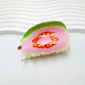 Pink guava shaped acrylic hair claw clip with green rind and seed pattern detail - Guava