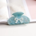 Pinza per capelli con fiocco azzurro e strass per uno styling elegante - Blu
