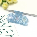 Blue ocean style claw clip with white jellyfish pattern and shell texture finish - Jellyfish