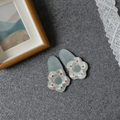 Pair of gray jelly translucent flower hair clips with red dots on white petals - Light Blue Floral