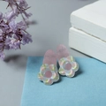 Pair of light pink floral resin hair clips with a jelly texture and spring closure - Blue Pink Flower