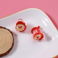 Mini pinces à cheveux Père Noël mignonnes pour coiffures de Noël sur fond rose - Père Noël