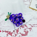 Barrette de Noël artisanale en peluche violette avec perles dorées et nœud vert - Violet