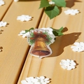 Mini pince à cheveux cloche de Noël en acrylique avec nœud rouge sur bois - Cloche 2.5cm