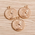 Macro detail of three rose gold Roman coin pendants with Queen Elizabeth II engraving - 10 Pieces/Pack (Medium) / Gold