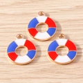 Macro view of three red white and blue enamel lifebuoy charms on light wood texture - Lifebuoy Stripe / 10 Pieces Pack / Red/White/Blue