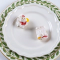 Mini Santa Claus hair claw clip for girls with vibrant red resin finish on white plate - Santa With Sack Style