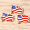 Detail of three USA flag star pendants with gold trim and colorful enamel finish - Large Flag / 10 Pieces Pack / Red/White/Blue