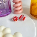 Cute set of two mini red mushroom hair claws with white snowflakes for Christmas - Snowflake Bell Style