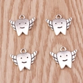 Set of 4 vintage silver smiling wing tooth charms for DIY jewelry and keychain making - Smiling Winged Tooth Charm / 10 Pieces Pack / Antique Silver