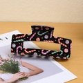Grande pince à cheveux rectangulaire avec motif de canne de Noël sur fond noir - 10.3 Fond Noir Sucre d'Orge Noël